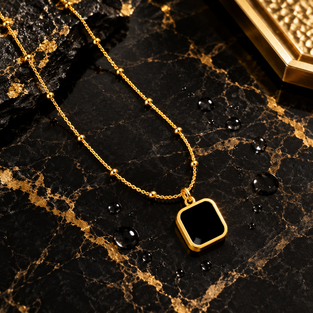 Black square pendant necklace black marble flat lay