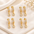 Pack of 4 Korean drop earrings cream background